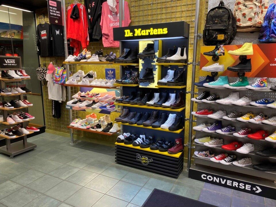 Nationwide Fixture Installations Inc Dr. Martens Case Study Millwork Packages Retail Rollouts Shop-in-Shop Custom Installation Services