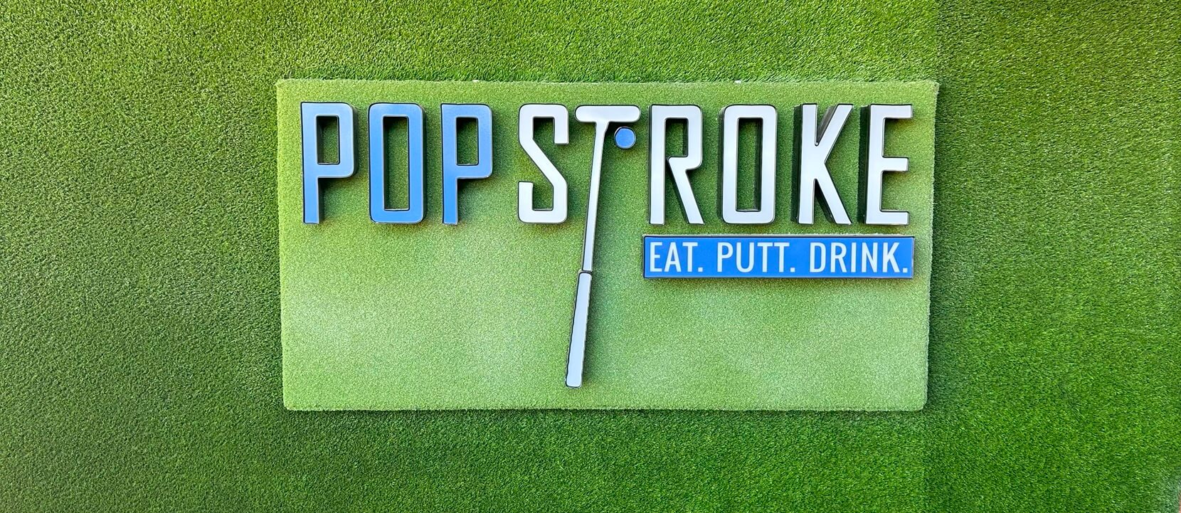 Pop Stroke Scottsdale AZ sign near bar